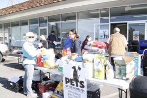 Pet food and supplies were distributed by volunteers. 